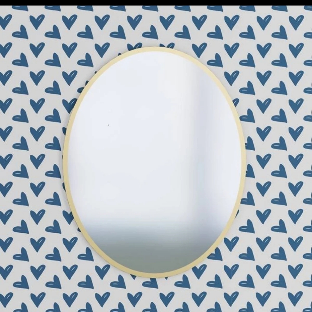 Oval magnetic mirror with gold rim for locker